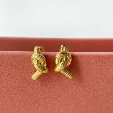 Aretes nudito